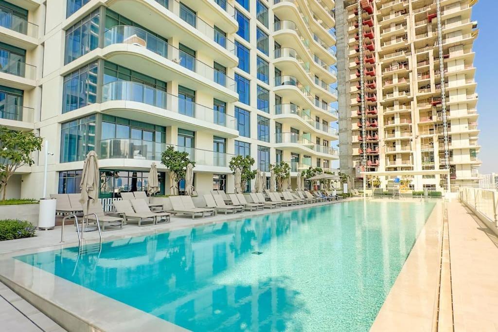 Beachfront Bliss – Apartment with Pool and Premium Amenities