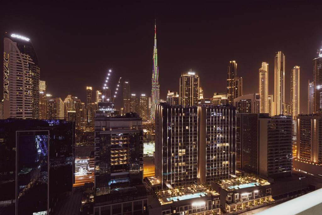 Full Burj Khalifa View – 4 min Dubai Mall & Fountain – Smart Home – Gym – Pool – Luxury 2 Bedroom