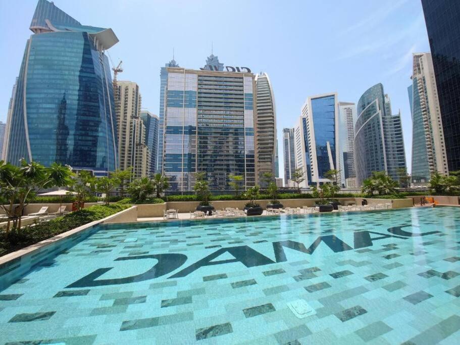 Luxury Canal 1BR with Exclusive Pool in ZADA Tower