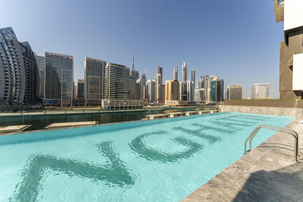 Studio Retreat with Canal and Burj Khalifa Views