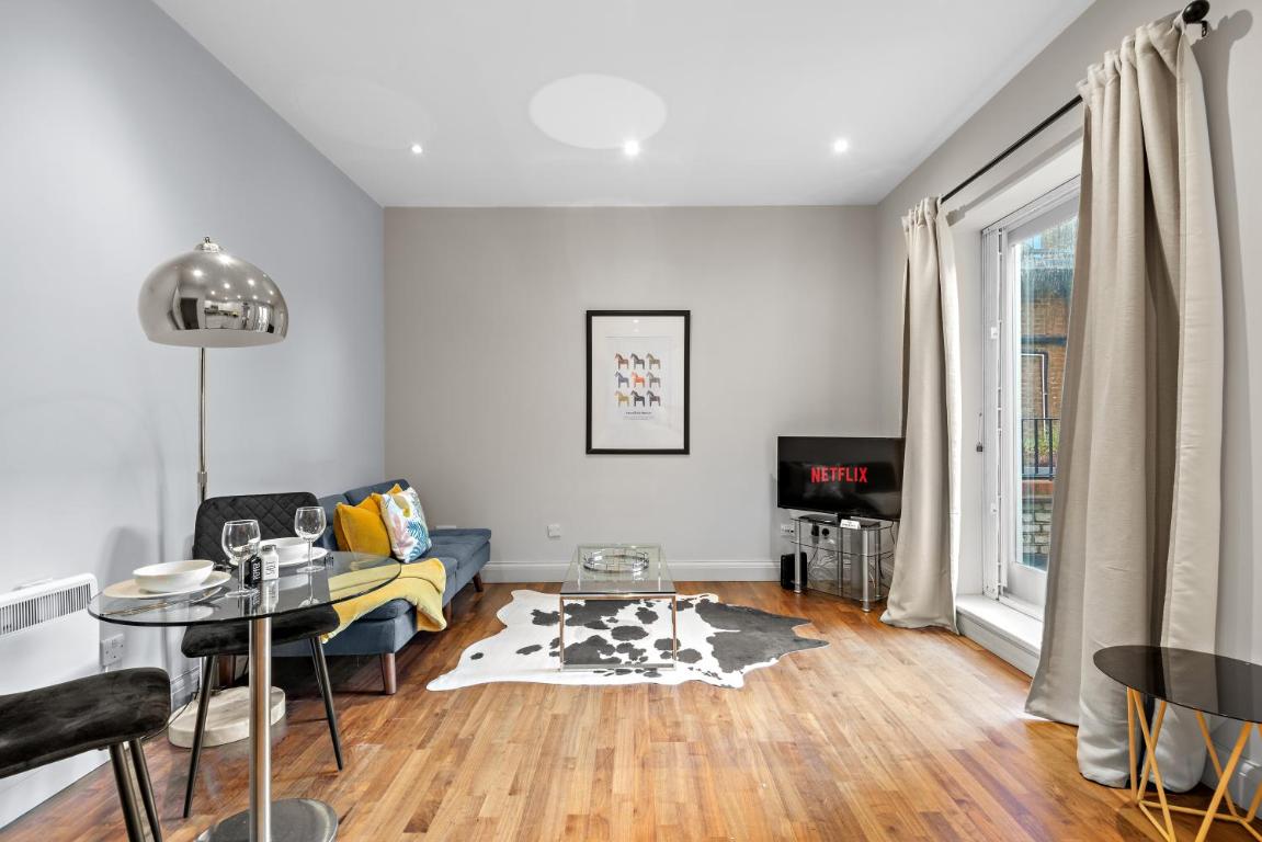 Notting Hill: Stylish 1BR with Terrace – Suite Inn