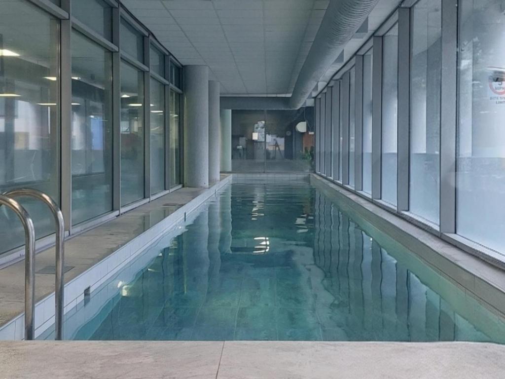 Upscale London Condo in a Private gated estate with indoor pool, gym, Free parking & Lots more