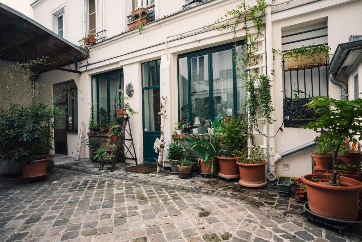 Duplex sur cour arborée