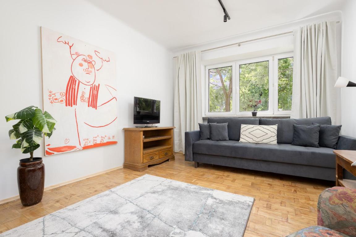 Przytulny i Tradycyjny Apartament na Parterze w Centrum Warszawy by Noclegi Renters