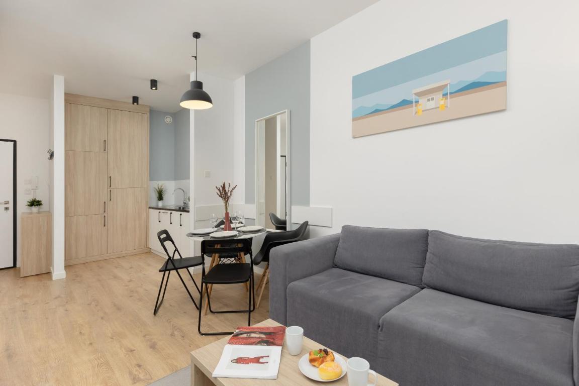 Wola Pet-friendly Apartments with AC Sławińska by Noclegi Renters